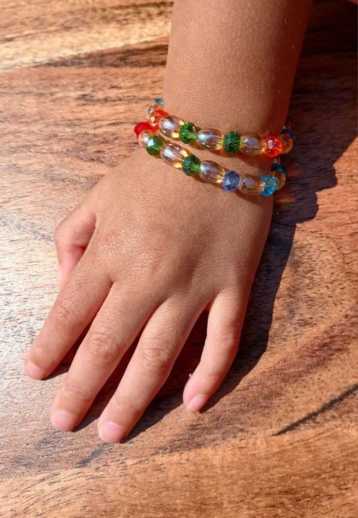 Colorful beaded bracelets worn on a wrist